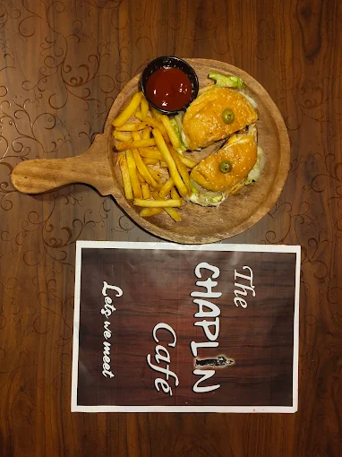 The Chaplin Cafe interior and pizza in Dehra